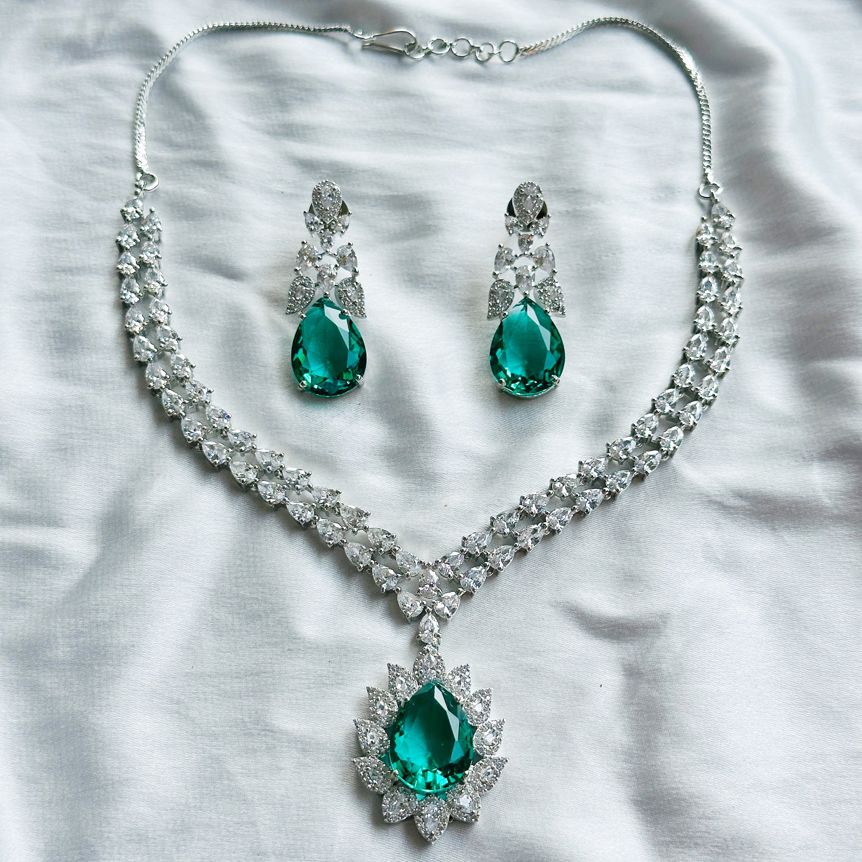 Arha Collection Sea Green Topaz Cubic Zircon American Diamond Silver Plated Necklace Set