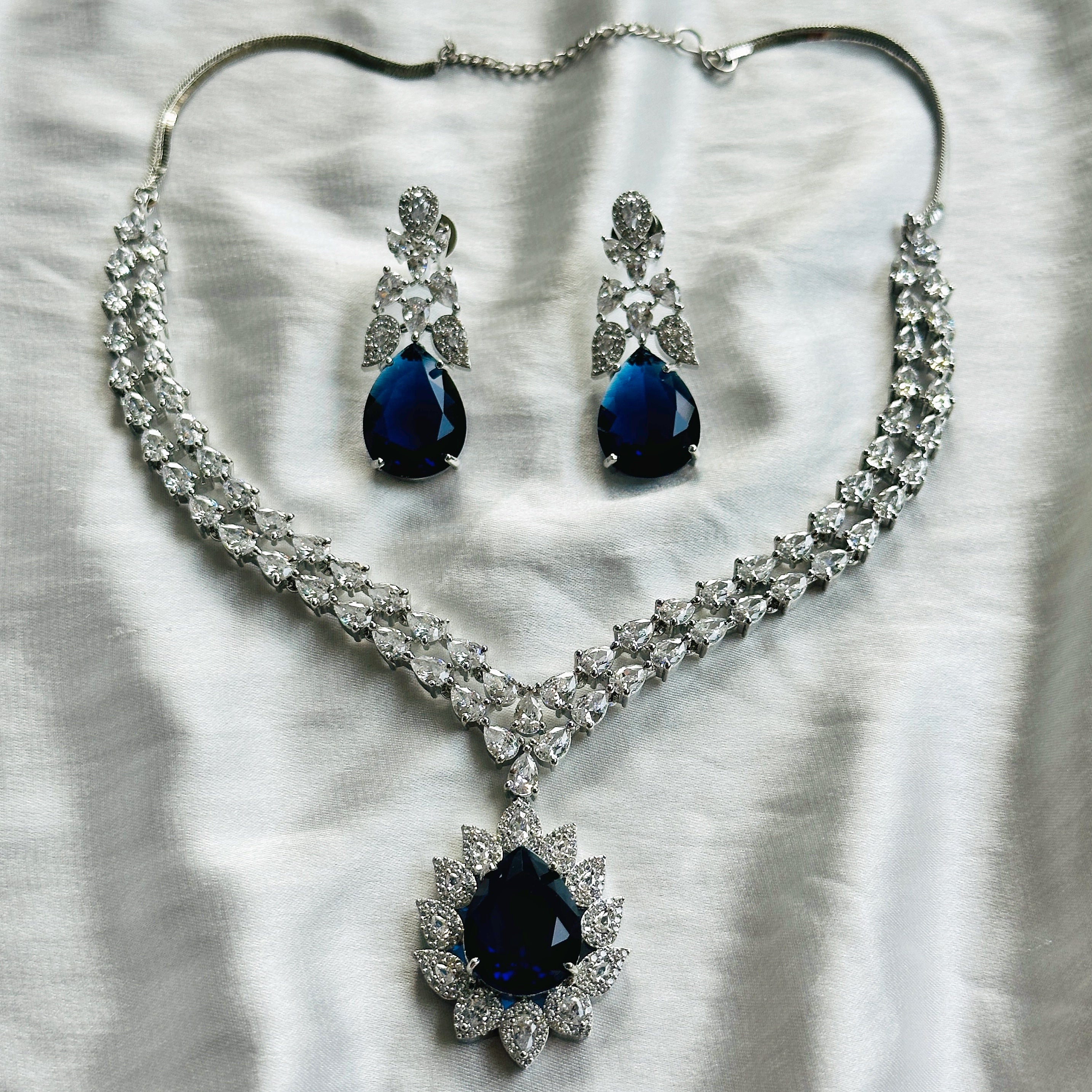 Arha Collection Blue Sapphire Cubic Zircon American Diamond Silver Plated Necklace Set