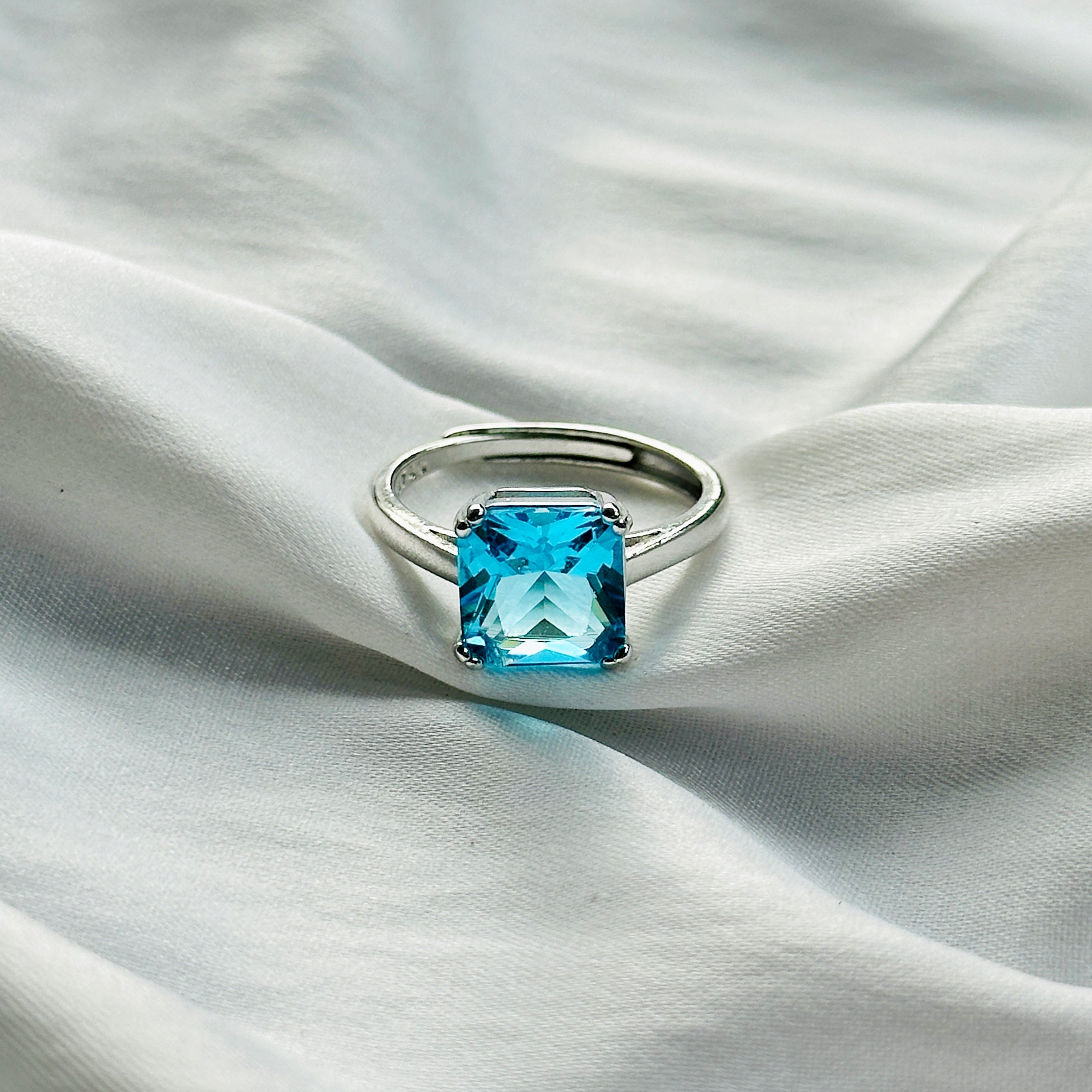 Ariva Collection Aqua Blue Sapphire Cubic Zircon Ice Cut Stone Silver Plated Adjustable Ring